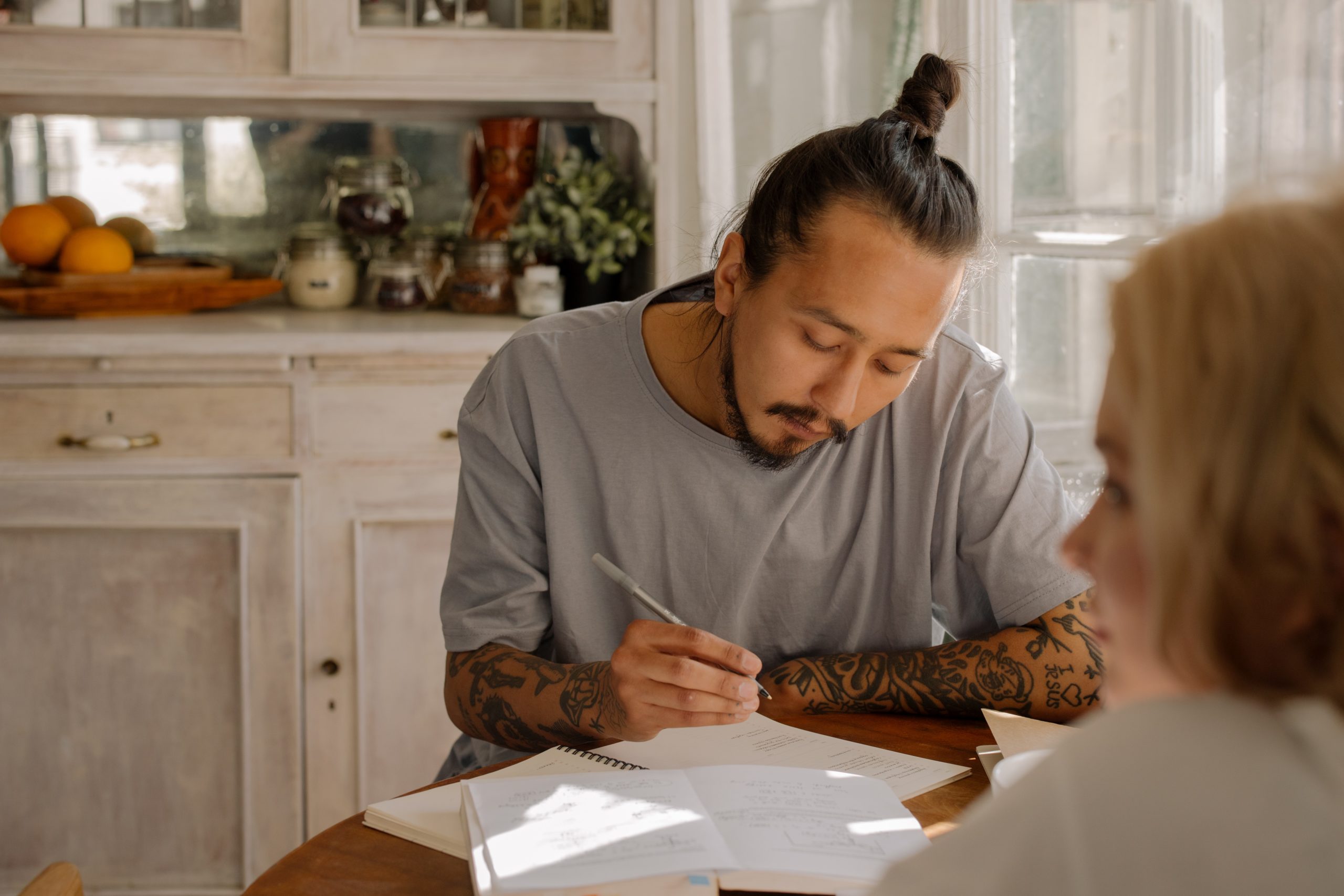 Man sitting at a table working